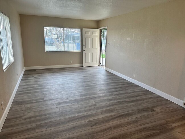 Building Photo - This cute home won't last long with a new ...