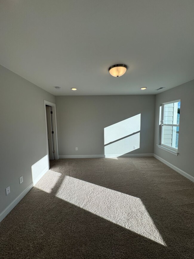 Building Photo - Beautiful, New Constuction Townhome Close ...