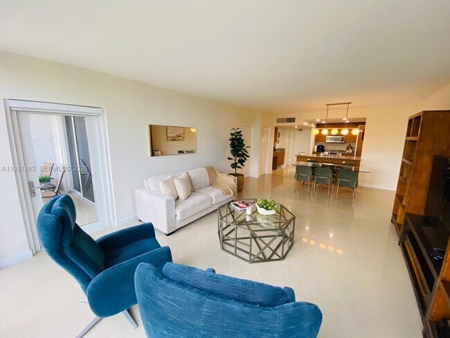 Building Photo - 10275 Collins Ave