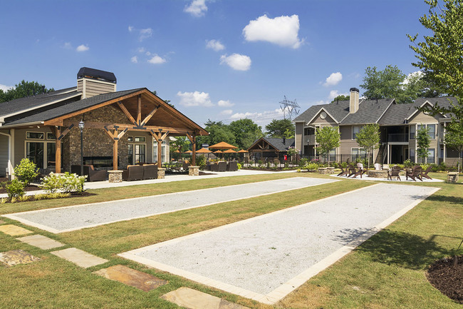 Bocce Ball Courts - The Arbors at Breckinridge Apartment Homes