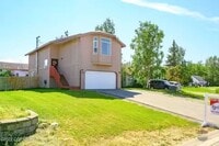Building Photo - Check out the private fenced backyard!