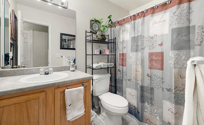 Building Photo - Spacious 5-Bedroom Home with Bonus Entertainment Room & Low-Maintenance Yard