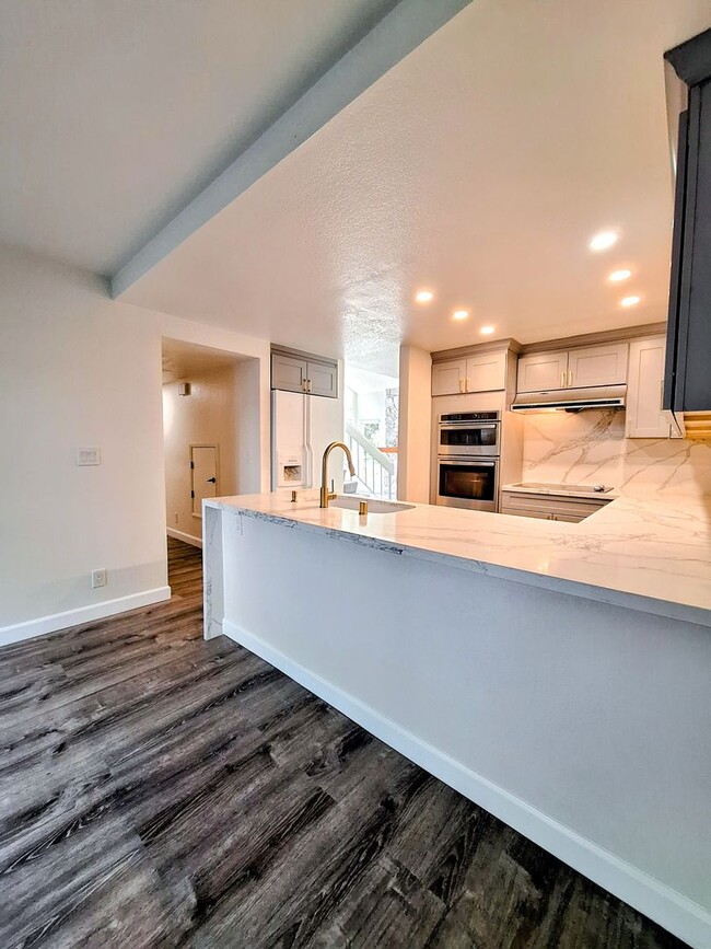 Building Photo - Spacious Two-Story 3bd Townhouse With Private Patios, Balcony, & Garage