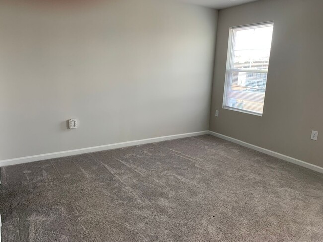 Building Photo - Gorgeous New Construction Townhome! PRICE ...