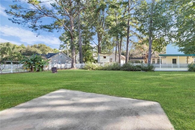 Building Photo - 4-Bedroom Home in Wild Heron with Front Porch and Fenced Yard