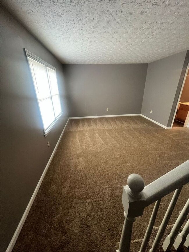 Building Photo - FINALLY a 2 bedroom 1.5 bath townhome available in Lawrenceville!