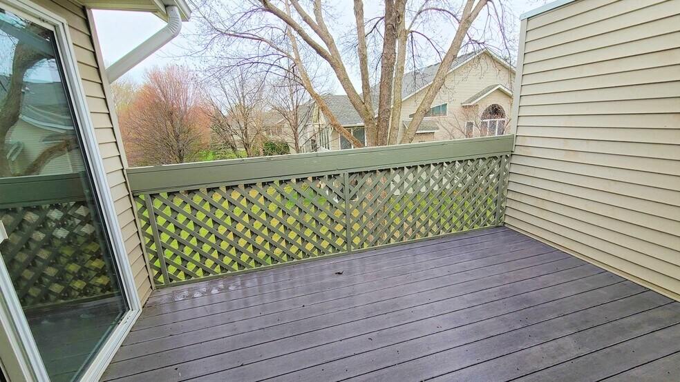 deck upstairs joined to sunroom and master bedroom - 1480 Violet Ln