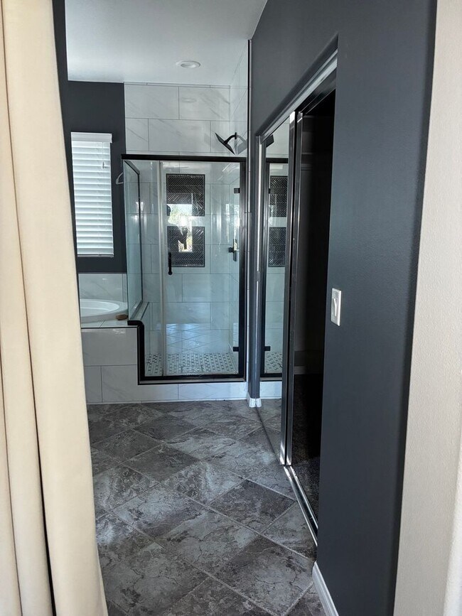 Building Photo - Smart 3-Bedroom Home with Solar & 2-Car Ga...