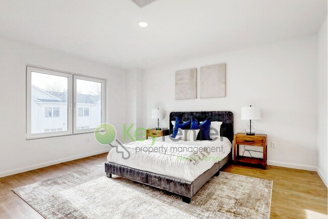 Building Photo - Modern New Construction 3 Bedroom Townhome with Garage & Driveway — First Occupancy!