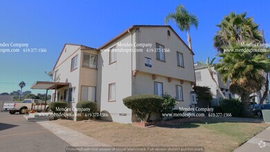 Building Photo - Upstairs 2 bd/1 bth Apartment with Hardwoo...