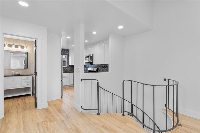 Building Photo - COMPLETELY REMODELED, BRIGHT & AIRY, TRI-LEVEL HOME W/ TOP-FLOOR GREAT ROOM LIVING SPACE, 2-CAR G...