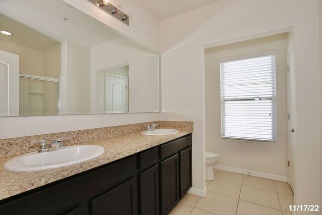 Building Photo - Spacious 3/2.5 Townhome with a 2 Car Garage and a Beautiful Pond View in Westwood Condos - Orlando!