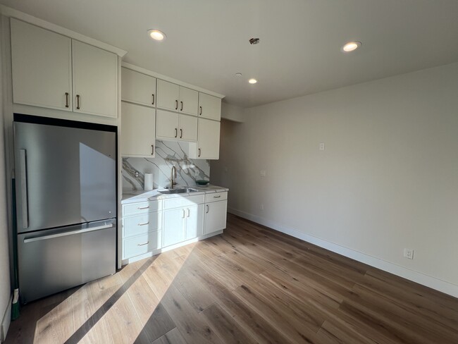 Multi generational space with separate entrance, brand new kitchenette and refrigerator - 34189 Hourglass St