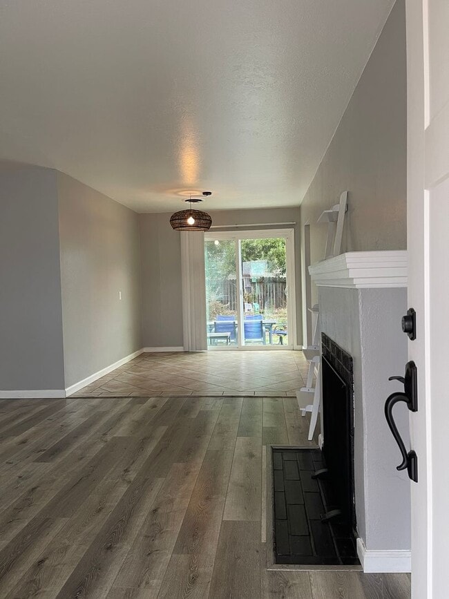 Building Photo - Bright, Updated Home with Garage, Laundry, and Private Yard