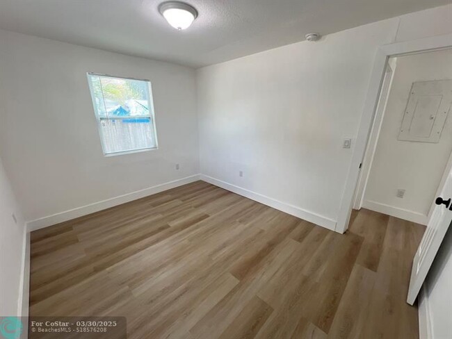 Building Photo - 10540 NW 28th Ave