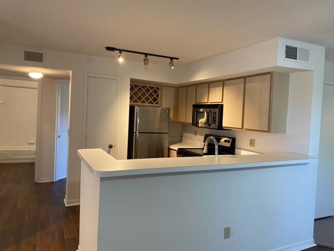 Building Photo - Stylish 2 Bed, 2 Bath Condo with New Vinyl Plank Flooring | Live the Resort Lifestyle at Bermuda ...