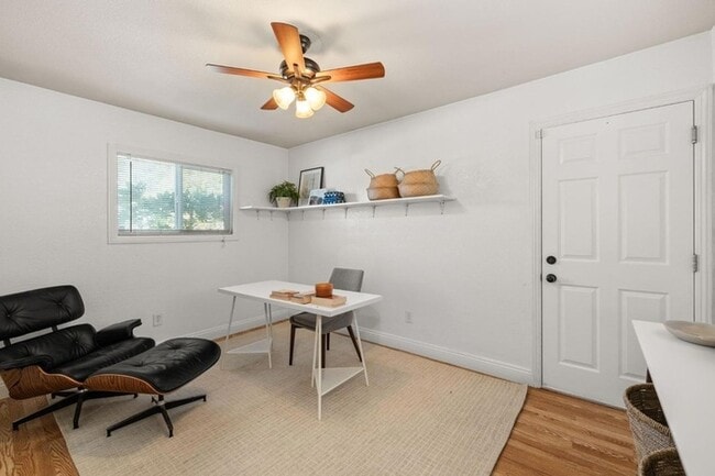 Building Photo - Welcome to this stunning 4-bedroom, 2-bath...