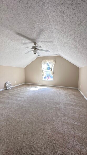 Bonus room looking toward the front - 145 White Dogwood Ln