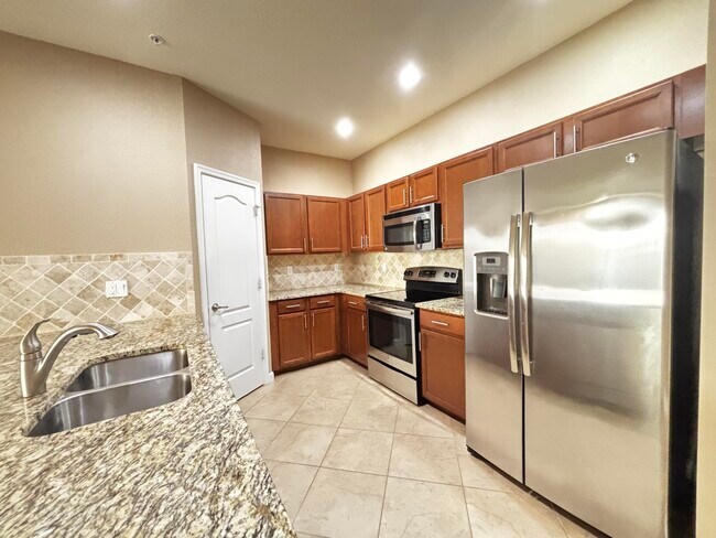Building Photo - 9480 SW Merlin Ct
