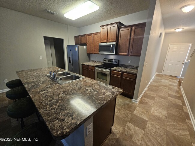 Building Photo - 8476 Julia Marie Cir