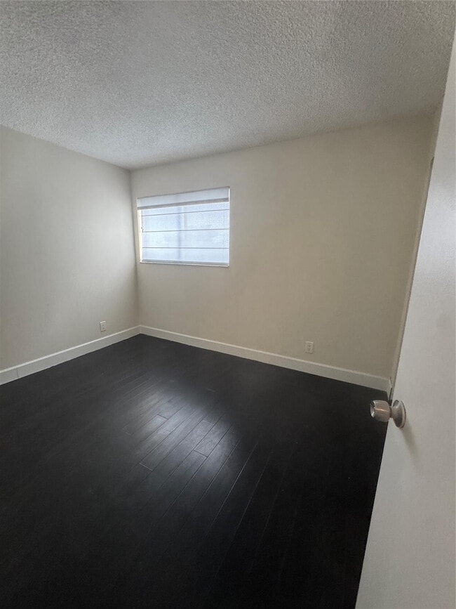 Building Photo - 8750 N Sherman Cir