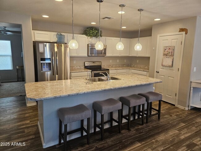 Building Photo - 40872 W Portis Dr