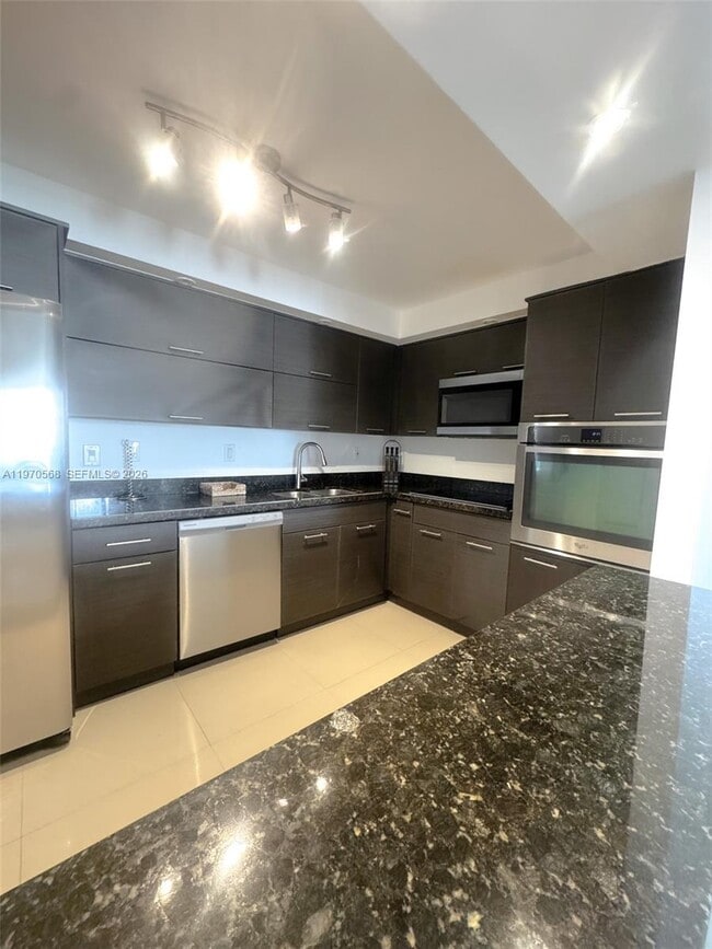 Building Photo - 19390 Collins Ave