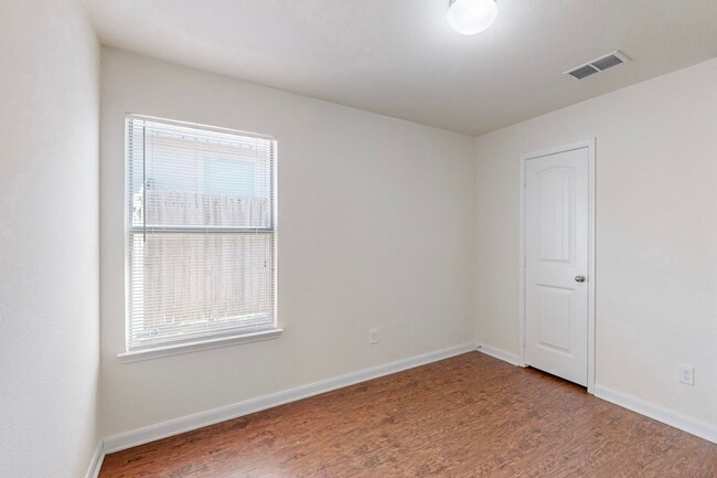 Building Photo - Spacious and Welcoming 4-Bedroom Home with...