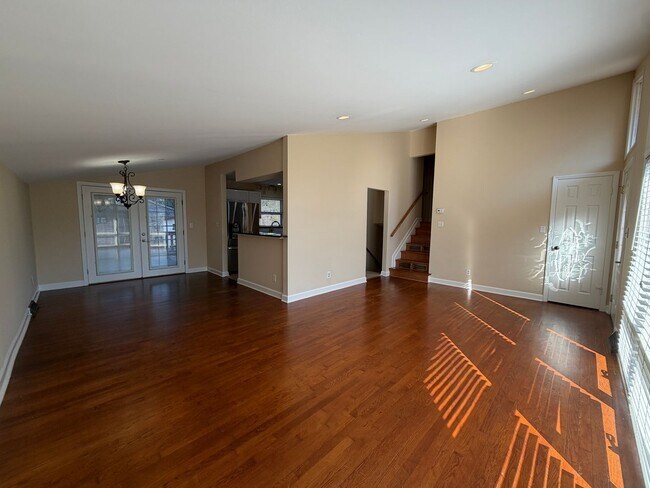 Building Photo - Freshly Painted Split-Level Home with Large Deck & Lawn Care Included