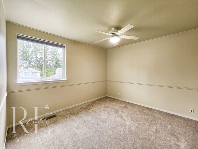 Building Photo - Modern Elegance Meets Tranquil Lakeside Living On Osprey Circle