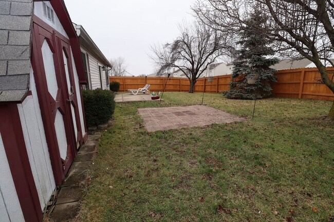 Building Photo - Discover this well-maintained 3-bedroom, 2-bath home in Indianapolis featuring an attached garage...