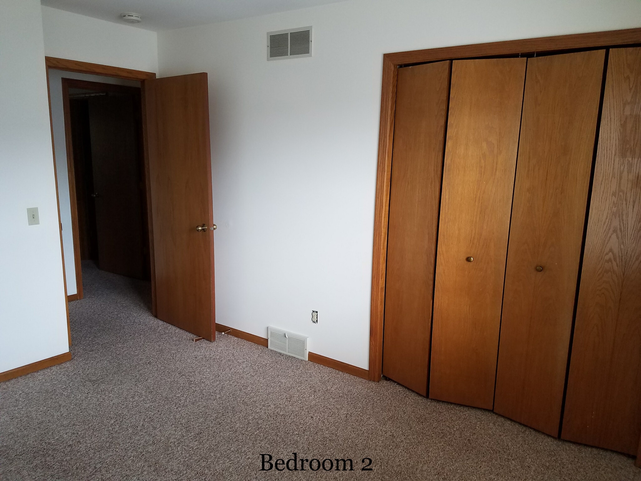 Bedroom #2 w view of closet - 1010 N Gammon Rd