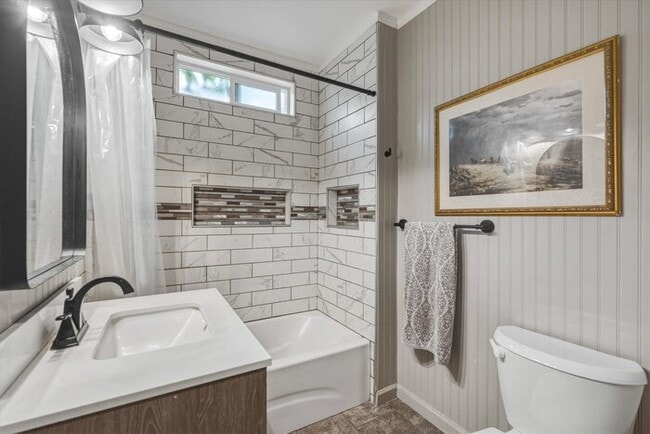 Building Photo - COME HOME TO THIS THREE BEDROOM CHARMER
