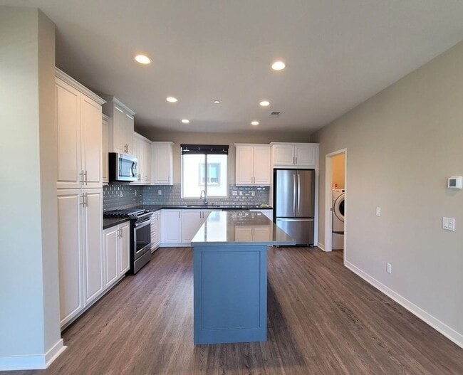 Building Photo - Beautiful Modern 3-Story Townhome