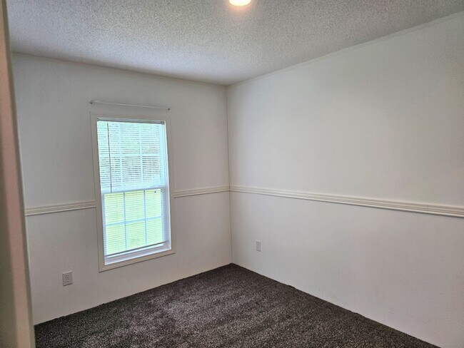 Building Photo - Welcome Home! Spacious 3-Bed, 2-Bath Split Floor Plan on ¾ Acre Lot