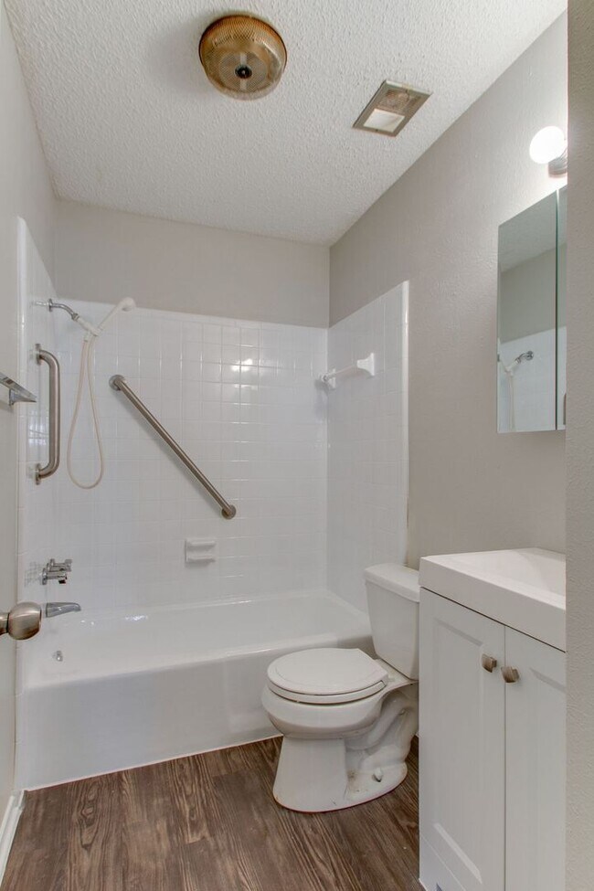 Building Photo - No Carpet! Great tree shaded yard!