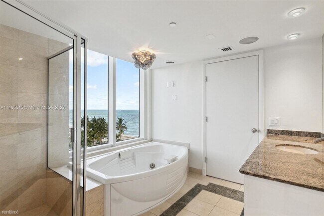 Building Photo - 4 br, 5.5 bath Condo - 18911 Collins Ave A...