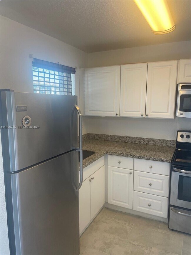 Building Photo - 8500 Sunrise Lakes Blvd