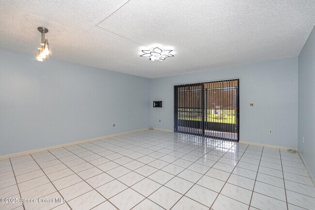 Building Photo - 5800 N Banana River Blvd