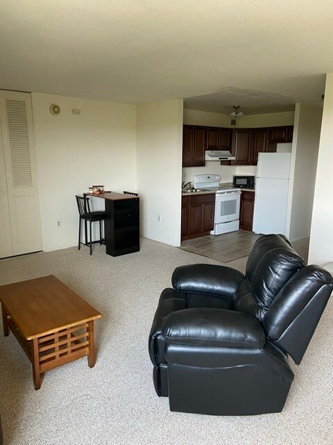 Living room kitchen view - 1 E University Pky