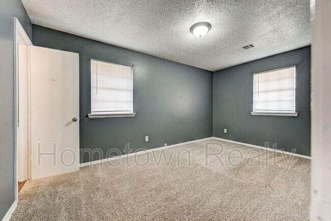 Building Photo - 8616 N Harvey Ave