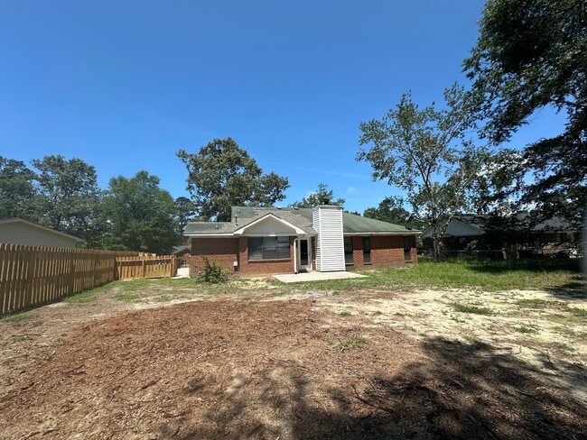 Building Photo - 3/2 No carpet & Fenced yard off Old Waynes...
