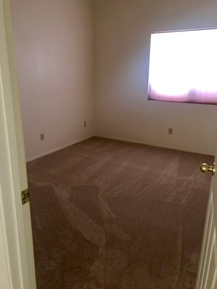 Building Photo - 9908 N Woodstone Trail