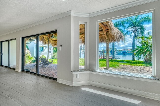 Building Photo - Treasure Island Three Bedroom, Two Bath Furnished Single Family Home on the water.