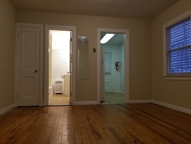 Building Photo - Wood floors, fresh paint, coin laundry, shared yard