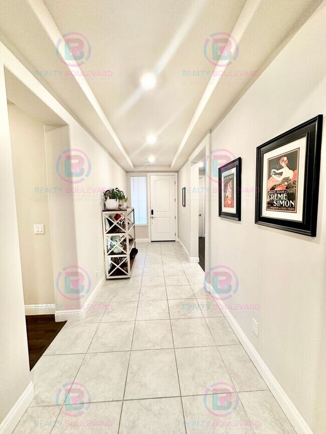 Building Photo - Welcome to your dream home, where modern elegance meets unparalleled convenience!