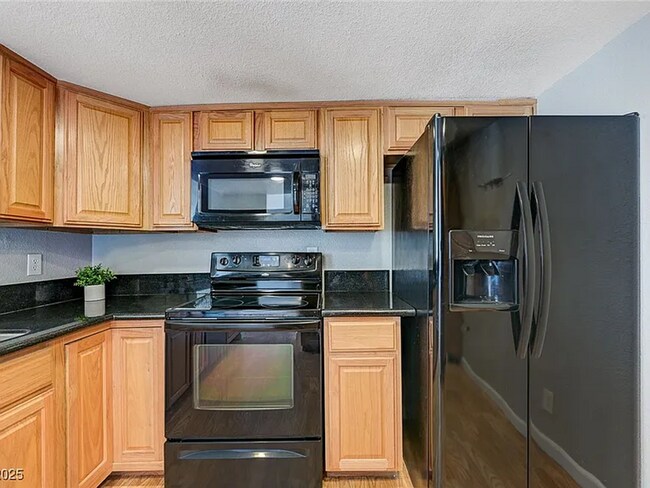 Building Photo - Enjoy resort-style living in this 2 Bed 2 Bath Condo with Stunning Strip Views in the Wimbledon C...