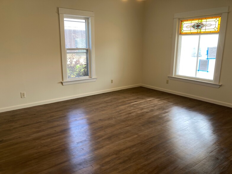 Living Room with Stained Glass Window - 213 Lake Ave W