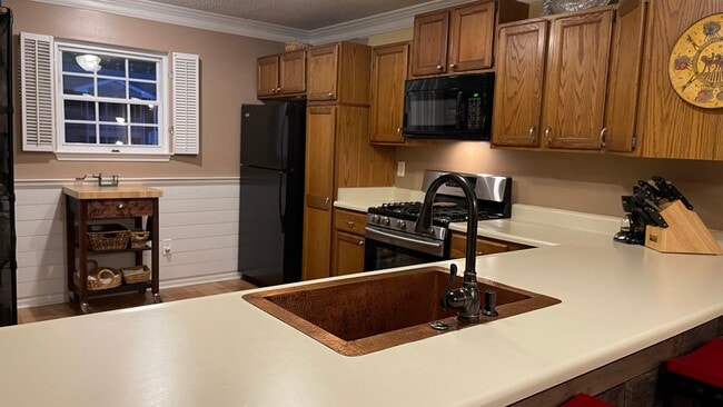 Kitchen from den - 229 Quail Run