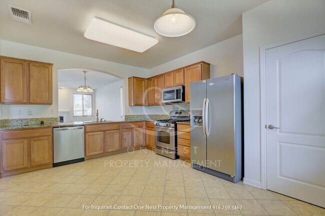 Building Photo - Charming single-story home nestled in the serene Edgewater Community